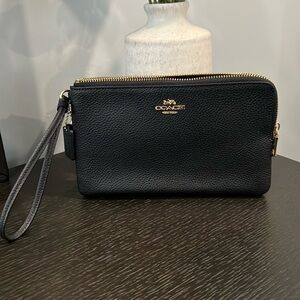 New with tags COACH wristlet wallet.